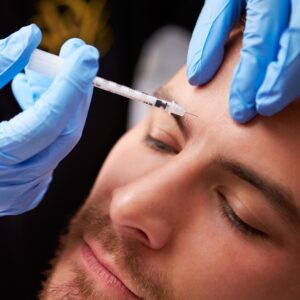 a man getting botox injection