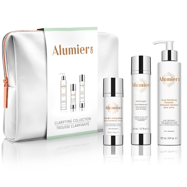 The Clarifying Collection set features three carefully curated, essential home care products to support oily and blemish-prone skin. They are housed together in a white vegan leather cosmetic bag.